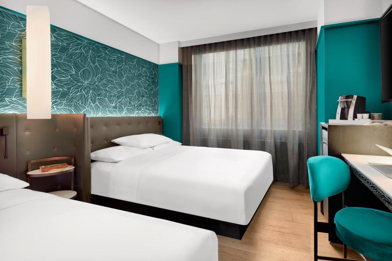 Queen Room with Two Queen Beds and City View